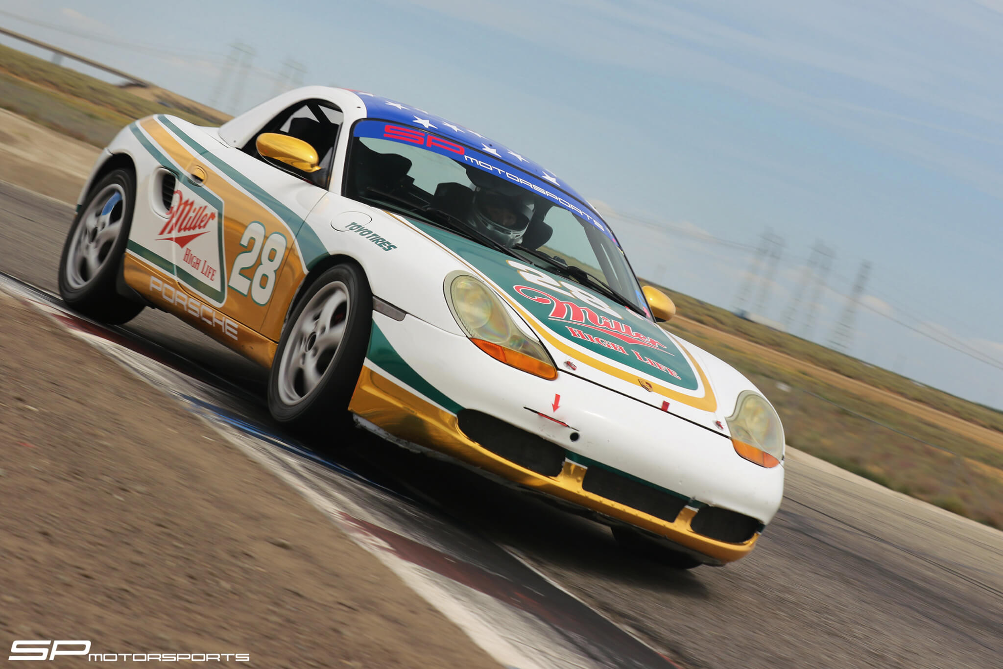 Close up Spec Boxster driving at Buttonwillow Raceway During Arrive and Drive