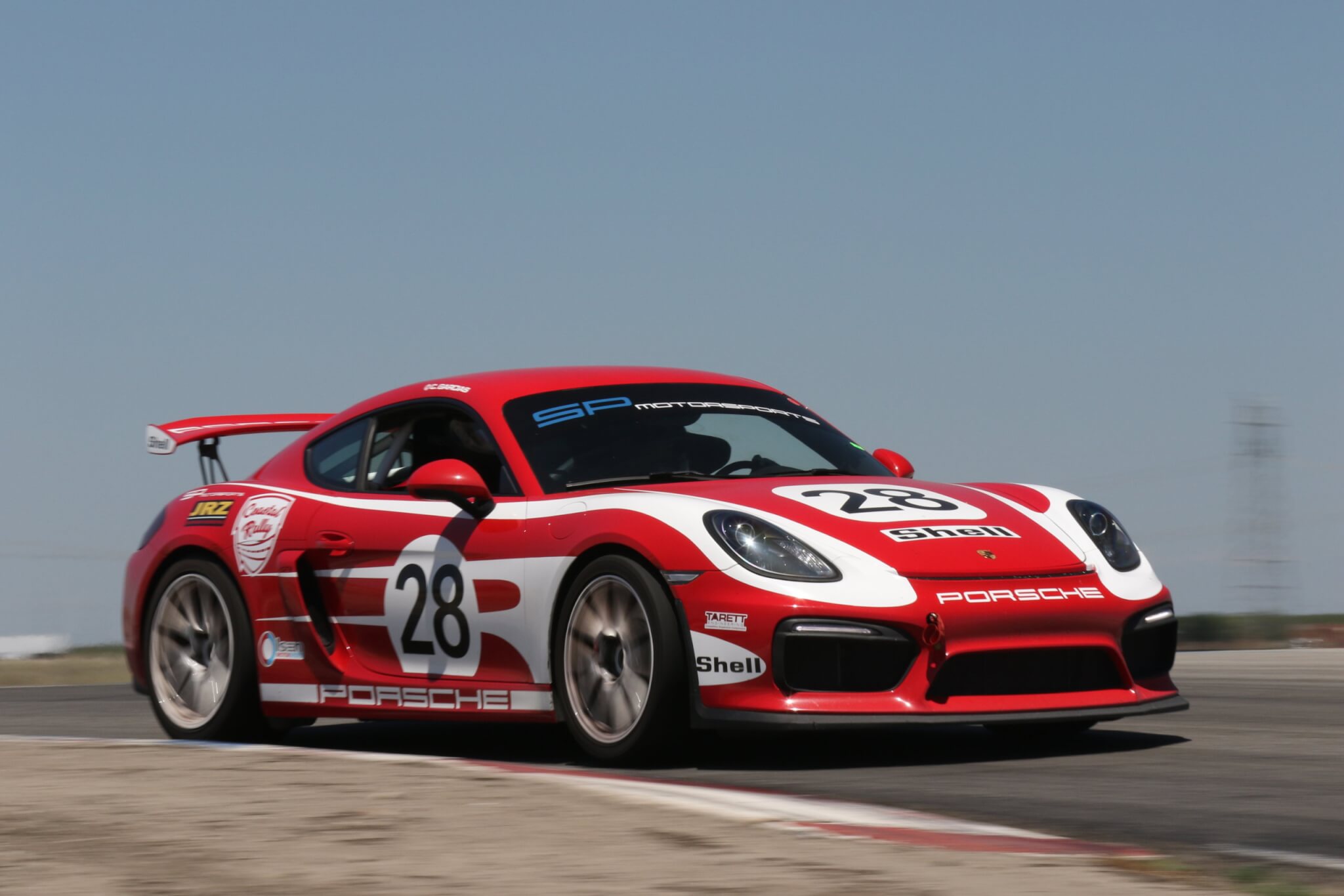 #28 SP Motorsports GT4 cornering a turn at Buttonwillow Raceway