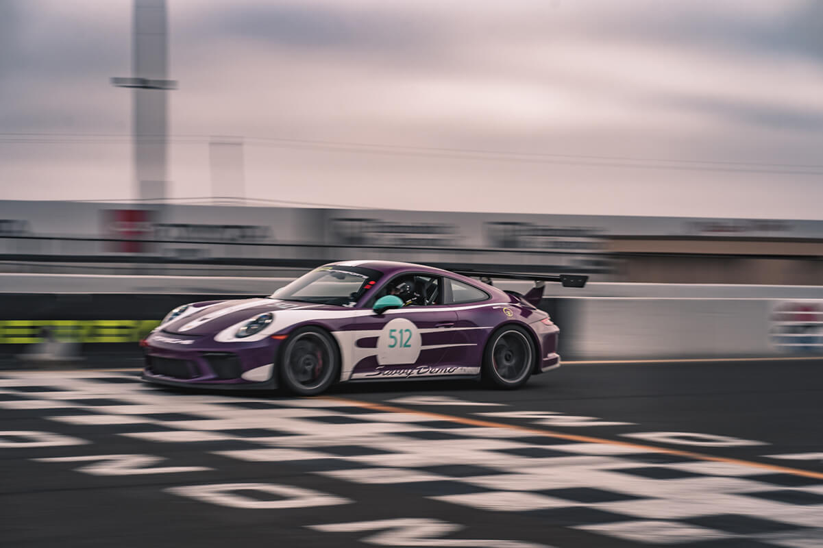 Purple GT3 #512 Crossing the finish line at the track